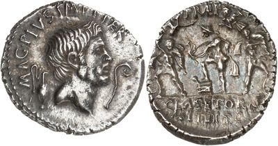 a silver coin with an image of a man and a woman on it