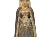 an image of a figurine of a woman with a dog on her lap