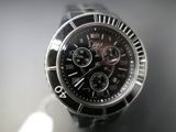 a close up of a watch on a table