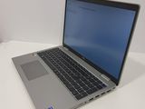 a laptop that is sitting on a white table