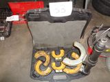 une boîte à outils qui contient tout un tas d'outils