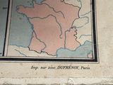 a picture of a map of france on the wall