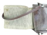 a purse that is open on a white surface