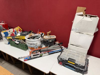 a table that has a bunch of tools on it