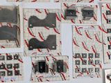 many pieces of paper that are on the wall