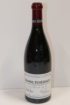 a bottle of wine that is sitting on a table
