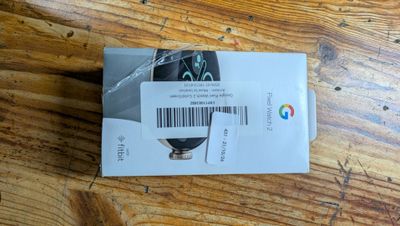 a box with a barcode on it sitting on a wooden table