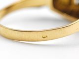 an image of a yellow gold ring with a yellow diamond
