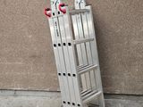 a ladder with two pairs of shoes on it next to a wall