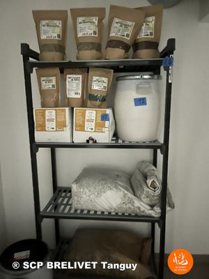 a shelf that has a lot of food on top of it