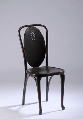 a black chair with a wooden seat on a white background