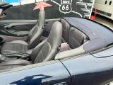 a picture of a convertible car with a star on the top