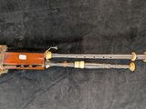 a close up of a rifle on a black surface