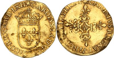 a gold coin with a crown on top of it