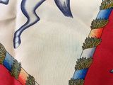 a picture of a horse on a red and white scarf