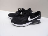 the nike air max is a black and white shoe with a white sole