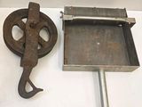two old tools that are on a white surface