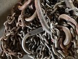 a pile of chains and hooks on the floor