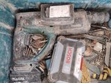 a blue tool box filled with assorted tools