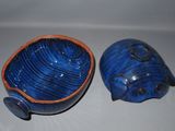 a small bowl and a small bowl sitting on a table
