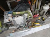 a pile of tools that are sitting on the floor