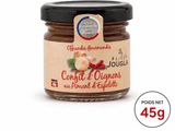 the jar of confit d ' origines is on a white surface