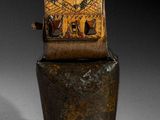 an old wooden box with a clock on top of it