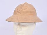 beige hat on a mannequin head on a white background