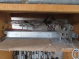 a box that has a bunch of metal items in it