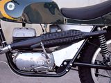 a motorcycle that is parked on the side of the street