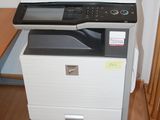a printer that is sitting on top of a desk