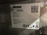 a sticker on the back of a machine with a qr code on it