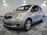 a picture of a silver toyota yaris parked on a checkered floor