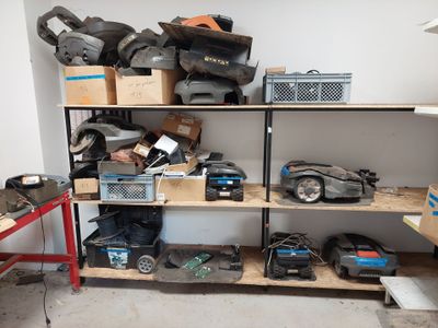 a shelf with many different types of tools on it