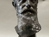a statue of a man with a beard on a table