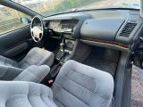 a picture of a car that is sitting in a lot