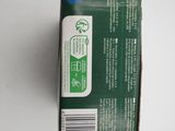a box of toothpaste sitting on a white surface