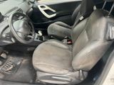 a picture of a dirty car with a steering wheel
