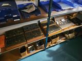 a shelf with many different types of tools on it