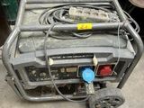 a small generator that is sitting on the ground