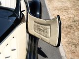 a close up of a car ' s door handle and mirror