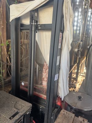 an image of a kitchen area with a stove and a table