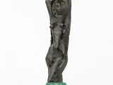an image of a sculpture of a woman on a pedestal
