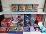 many children ' s books on a shelf next to each other