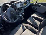the interior of a car with a steering wheel and a dashboard