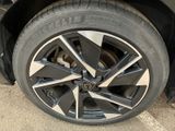 a close up of a tire on a car ' s rim