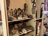 many masks on the shelves in the room