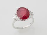 an oval ruby and diamond ring