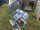 an image of a machine that is sitting in the grass
