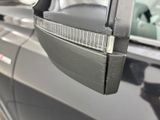 a close up of a car ' s door handle and side mirror